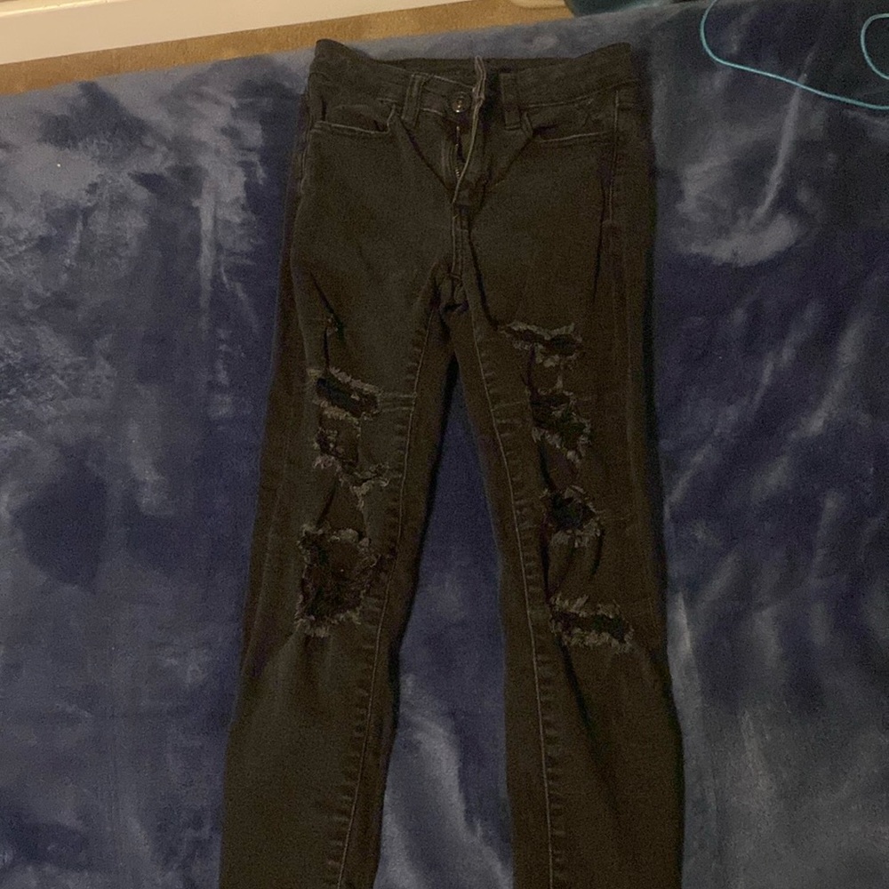 Used ripped jeans